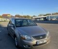 Бежевий Кіа Черато, об'ємом двигуна 2 л та пробігом 147 тис. км за 4900 $, фото 1 на Automoto.ua