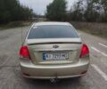 Бежевый Киа Черато, объемом двигателя 1.6 л и пробегом 305 тыс. км за 4500 $, фото 5 на Automoto.ua