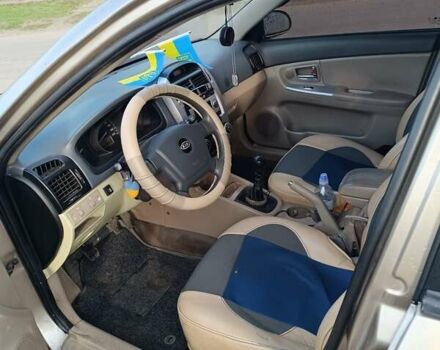 Бежевий Кіа Черато, об'ємом двигуна 1.6 л та пробігом 205 тис. км за 4600 $, фото 9 на Automoto.ua