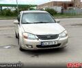 Бежевый Киа Черато, объемом двигателя 2 л и пробегом 255 тыс. км за 3700 $, фото 3 на Automoto.ua