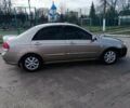 Бежевий Кіа Черато, об'ємом двигуна 1.6 л та пробігом 205 тис. км за 4600 $, фото 4 на Automoto.ua