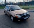 Бежевий Кіа Черато, об'ємом двигуна 1.6 л та пробігом 205 тис. км за 4600 $, фото 2 на Automoto.ua