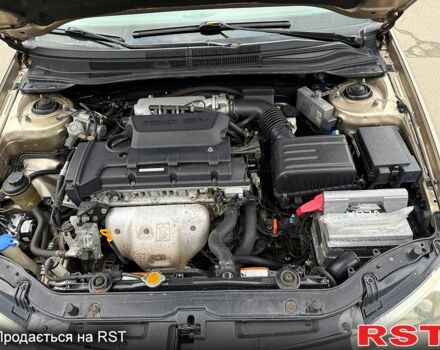 Бежевый Киа Черато, объемом двигателя 2 л и пробегом 255 тыс. км за 3700 $, фото 8 на Automoto.ua