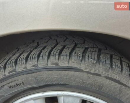 Бежевый Киа Черато, объемом двигателя 2 л и пробегом 210 тыс. км за 5300 $, фото 18 на Automoto.ua