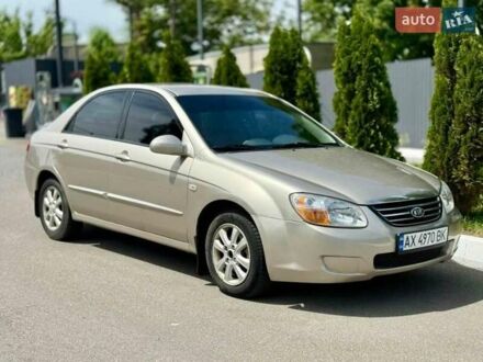 Бежевый Киа Черато, объемом двигателя 2 л и пробегом 250 тыс. км за 4100 $, фото 1 на Automoto.ua
