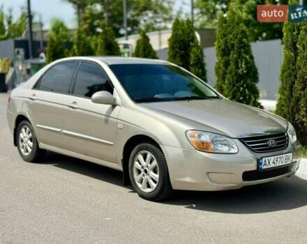 Бежевий Кіа Черато, об'ємом двигуна 2 л та пробігом 250 тис. км за 4100 $, фото 1 на Automoto.ua