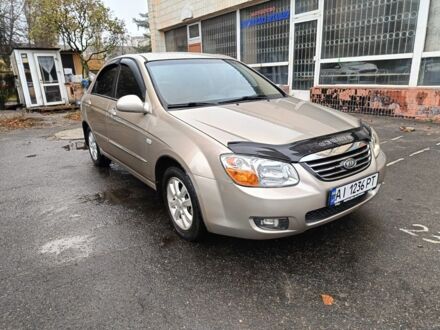 Бежевый Киа Черато, объемом двигателя 2 л и пробегом 195 тыс. км за 4250 $, фото 1 на Automoto.ua