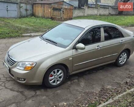 Бежевый Киа Черато, объемом двигателя 2 л и пробегом 210 тыс. км за 5300 $, фото 1 на Automoto.ua