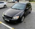 Черный Киа Черато, объемом двигателя 2 л и пробегом 320 тыс. км за 2900 $, фото 1 на Automoto.ua