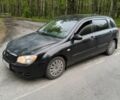 Черный Киа Черато, объемом двигателя 2 л и пробегом 340 тыс. км за 3299 $, фото 1 на Automoto.ua
