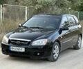 Чорний Кіа Черато, об'ємом двигуна 1.6 л та пробігом 156 тис. км за 3990 $, фото 1 на Automoto.ua