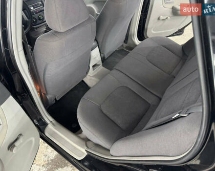 Киа Черато 2006 в Кременце на Automoto.ua Черный Киа Черато, объемом двигателя 1.6 л и пробегом 132 тыс. км за 4600 $, фото 25 на Automoto.ua