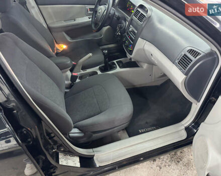 Киа Черато 2006 в Кременце на Automoto.ua Черный Киа Черато, объемом двигателя 1.6 л и пробегом 132 тыс. км за 4600 $, фото 15 на Automoto.ua