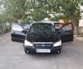 Чорний Кіа Черато, об'ємом двигуна 1.6 л та пробігом 292 тис. км за 3950 $, фото 1 на Automoto.ua