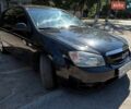 Черный Киа Черато, объемом двигателя 1.59 л и пробегом 310 тыс. км за 3500 $, фото 1 на Automoto.ua
