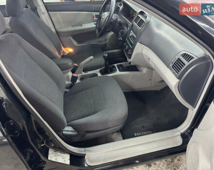 Киа Черато 2006 в Кременце на Automoto.ua Черный Киа Черато, объемом двигателя 1.6 л и пробегом 132 тыс. км за 4600 $, фото 14 на Automoto.ua