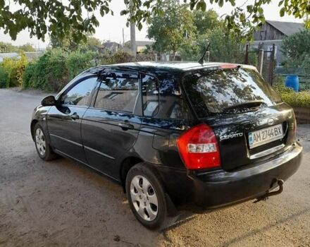Чорний Кіа Черато, об'ємом двигуна 1.6 л та пробігом 292 тис. км за 3950 $, фото 13 на Automoto.ua