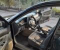 Чорний Кіа Черато, об'ємом двигуна 1.6 л та пробігом 292 тис. км за 3950 $, фото 2 на Automoto.ua