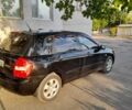 Чорний Кіа Черато, об'ємом двигуна 1.6 л та пробігом 292 тис. км за 3950 $, фото 7 на Automoto.ua