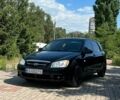 Чорний Кіа Черато, об'ємом двигуна 1.6 л та пробігом 206 тис. км за 3800 $, фото 1 на Automoto.ua