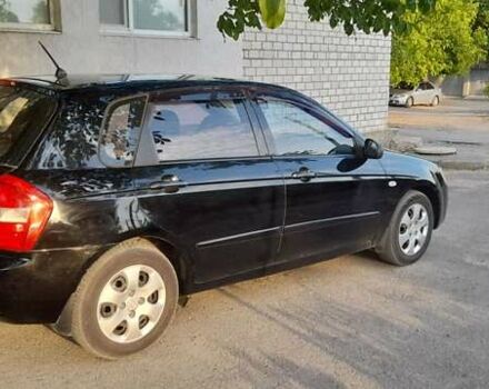 Чорний Кіа Черато, об'ємом двигуна 1.6 л та пробігом 292 тис. км за 3950 $, фото 14 на Automoto.ua