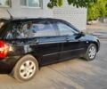 Чорний Кіа Черато, об'ємом двигуна 1.6 л та пробігом 292 тис. км за 3950 $, фото 14 на Automoto.ua