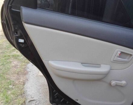 Черный Киа Черато, объемом двигателя 1.6 л и пробегом 213 тыс. км за 5000 $, фото 7 на Automoto.ua