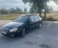 Черный Киа Черато, объемом двигателя 1.59 л и пробегом 200 тыс. км за 2600 $, фото 1 на Automoto.ua