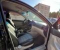 Черный Киа Черато, объемом двигателя 1.58 л и пробегом 190 тыс. км за 4300 $, фото 3 на Automoto.ua