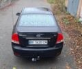 Черный Киа Черато, объемом двигателя 1.6 л и пробегом 280 тыс. км за 3517 $, фото 14 на Automoto.ua
