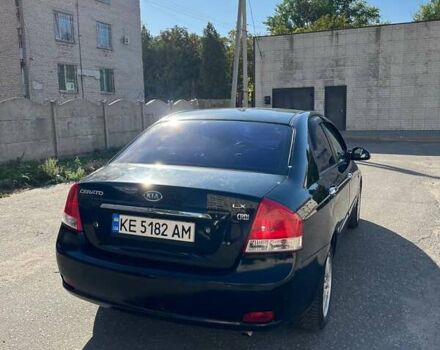Черный Киа Черато, объемом двигателя 1.58 л и пробегом 190 тыс. км за 4300 $, фото 1 на Automoto.ua