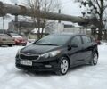 Чорний Кіа Черато, об'ємом двигуна 2 л та пробігом 67 тис. км за 10500 $, фото 1 на Automoto.ua