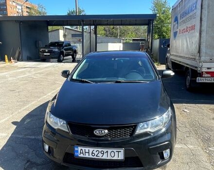Черный Киа Черато, объемом двигателя 1.6 л и пробегом 243 тыс. км за 7200 $, фото 2 на Automoto.ua
