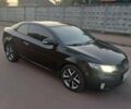 Чорний Кіа Черато, об'ємом двигуна 2 л та пробігом 261 тис. км за 7399 $, фото 1 на Automoto.ua