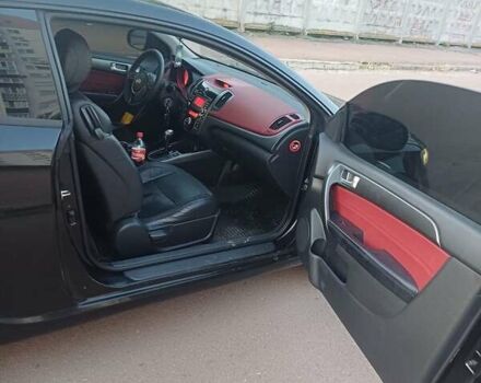 Чорний Кіа Черато, об'ємом двигуна 2 л та пробігом 261 тис. км за 7399 $, фото 8 на Automoto.ua