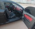 Чорний Кіа Черато, об'ємом двигуна 2 л та пробігом 261 тис. км за 7399 $, фото 8 на Automoto.ua