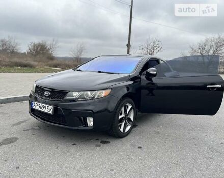 Чорний Кіа Черато, об'ємом двигуна 2 л та пробігом 53 тис. км за 8000 $, фото 11 на Automoto.ua