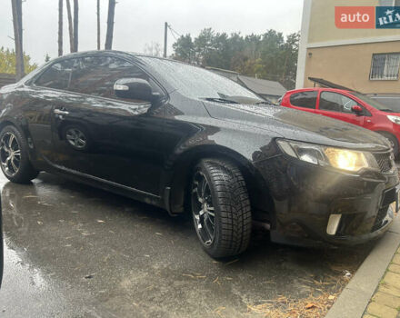 Чорний Кіа Черато, об'ємом двигуна 2 л та пробігом 209 тис. км за 8000 $, фото 11 на Automoto.ua