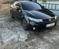 Чорний Кіа Черато, об'ємом двигуна 2 л та пробігом 194 тис. км за 7700 $, фото 1 на Automoto.ua