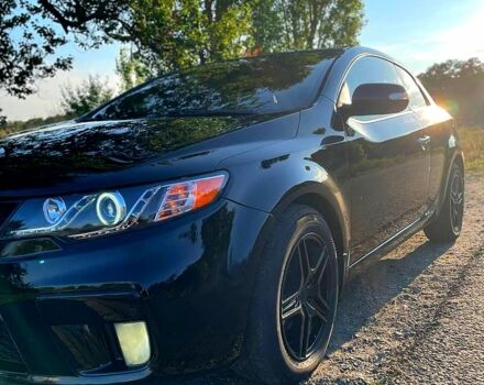 Чорний Кіа Черато, об'ємом двигуна 2 л та пробігом 238 тис. км за 7400 $, фото 1 на Automoto.ua