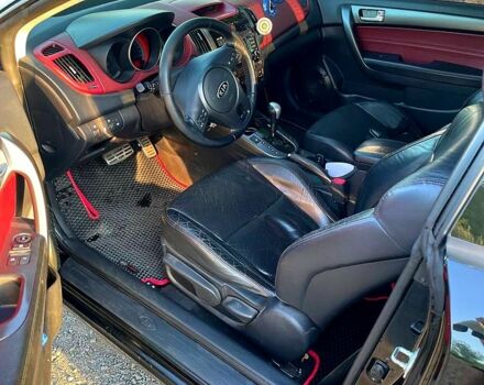 Чорний Кіа Черато, об'ємом двигуна 2 л та пробігом 238 тис. км за 7400 $, фото 5 на Automoto.ua