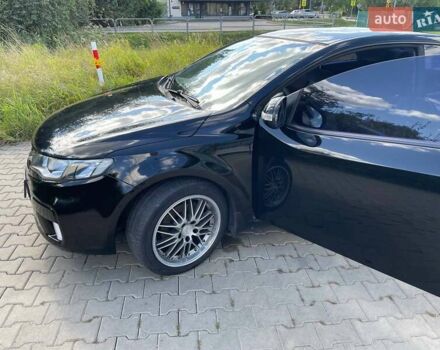 Чорний Кіа Черато, об'ємом двигуна 1.59 л та пробігом 121 тис. км за 7000 $, фото 2 на Automoto.ua