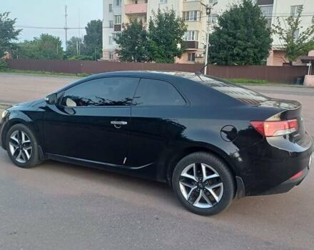 Чорний Кіа Черато, об'ємом двигуна 2 л та пробігом 261 тис. км за 7399 $, фото 3 на Automoto.ua