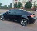 Чорний Кіа Черато, об'ємом двигуна 2 л та пробігом 261 тис. км за 7399 $, фото 3 на Automoto.ua