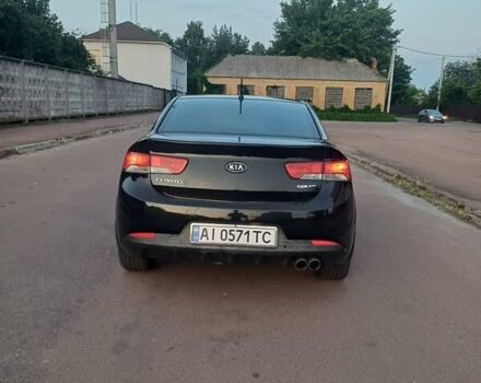 Чорний Кіа Черато, об'ємом двигуна 2 л та пробігом 261 тис. км за 7399 $, фото 2 на Automoto.ua