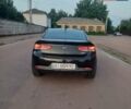 Чорний Кіа Черато, об'ємом двигуна 2 л та пробігом 261 тис. км за 7399 $, фото 2 на Automoto.ua
