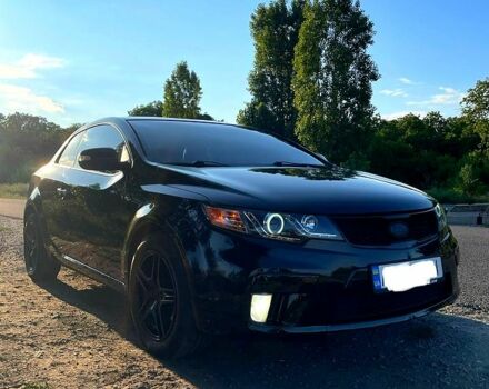 Чорний Кіа Черато, об'ємом двигуна 2 л та пробігом 238 тис. км за 7400 $, фото 4 на Automoto.ua