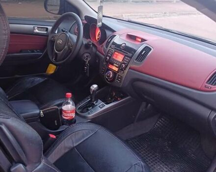 Чорний Кіа Черато, об'ємом двигуна 2 л та пробігом 261 тис. км за 7399 $, фото 9 на Automoto.ua