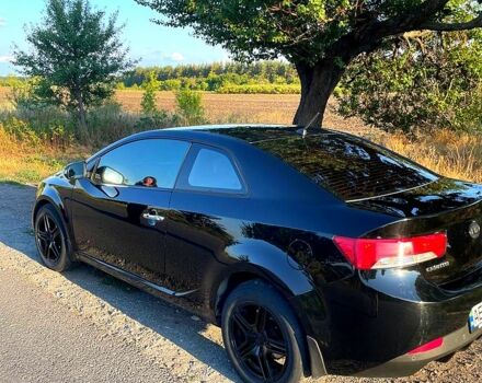 Чорний Кіа Черато, об'ємом двигуна 2 л та пробігом 238 тис. км за 7400 $, фото 2 на Automoto.ua