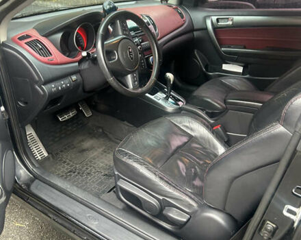 Чорний Кіа Черато, об'ємом двигуна 2 л та пробігом 209 тис. км за 8000 $, фото 5 на Automoto.ua